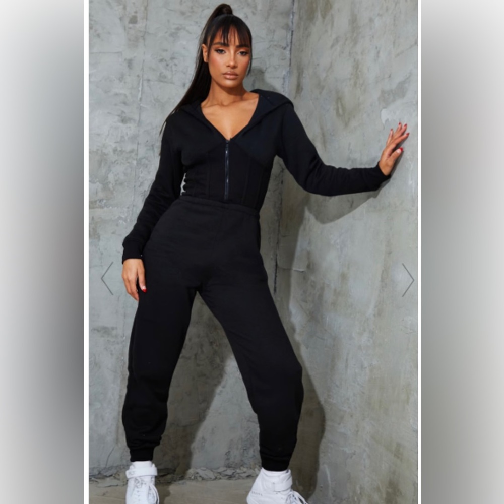 PRETTYLITTLETHING: BLACK CORSET DETAIL HOODED SWEAT JUMPSUIT SZ 12 (USA) (#2039)